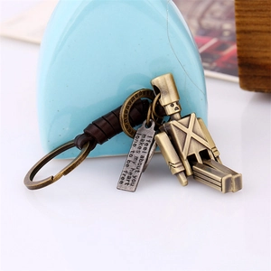 Retro handmade woven leather keychain featuring a movable bronze alloy robot and engraved tag