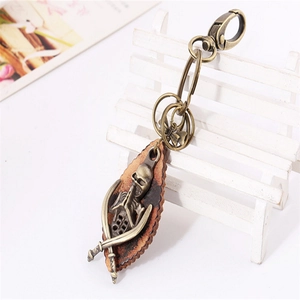 Vintage punk skull keychain with bronze cross cutlass and genuine brown leather