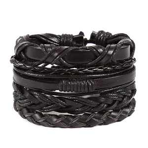 Vintage multilayer black leather bracelet set featuring handmade braided and smooth cords