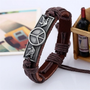 Bracelet en cuir tressé vintage avec signe de paix et oiseaux en argent antique