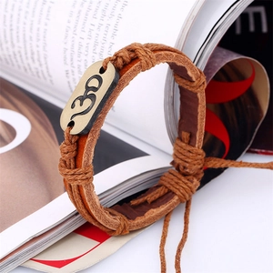 Bracelet tressé en cuir vintage avec plaque symbole Om et cordon réglable brun