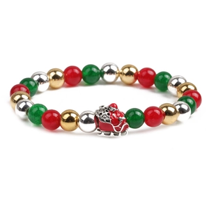 Weihnachtliches Hämatit-Perlenarmband mit rotem Schlittenanhänger und bunten Perlen