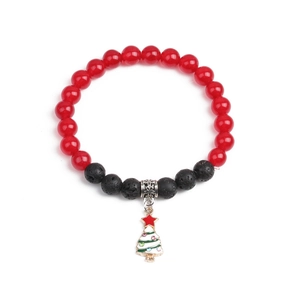 Christmas beaded bracelet with red agate and black volcanic stones and a white tree charm