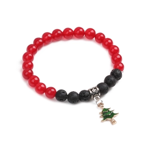 Close-up of a Christmas bracelet with red beads, black lava stones, and a tree pendant