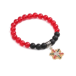 Detailed view of red agate and lava stone beads with sparkling rhinestone snowflake charm