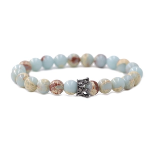 Natural stone crown bracelet with spotted mineral beads and micro-pave zircon crown