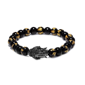 Pulsera budista de cuentas de ónix negro con cabeza de Buda y grabado dorado