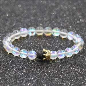 Moonstone and lava stone beaded crown bracelet with iridescent glow and gold crown detail