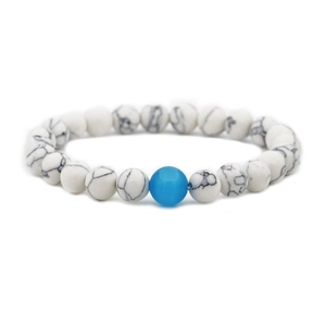 Distance bracelet set with white turquoise marble beads and a bright blue accent stone