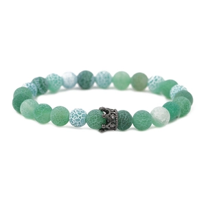 Lava stone and crown bead bracelet featuring green and white stones with micro-inlaid rhinestones