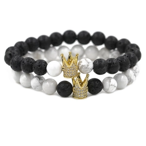 Crown bracelet set with white turquoise, black lava stone and micro pave gold crown charms