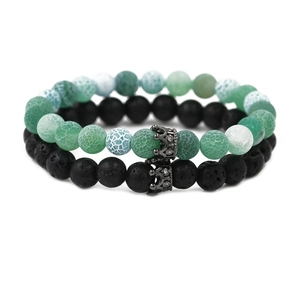 Green weathered stone and black volcanic rock crown beaded bracelets set for couples