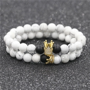 Set bracciali corona per coppia con perline in marmo bianco e nero opaco in oro
