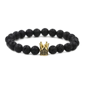Bracelet en pierre de lave avec couronne dorée sertie de zircons noirs brillants