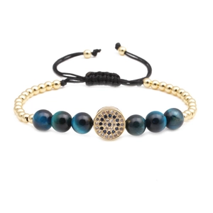 Adjustable blue tiger eye beaded bracelet with gold micro-pave zircon evil eye charm