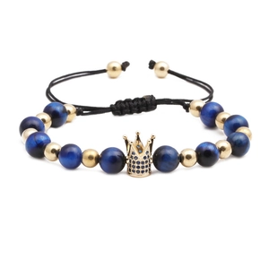 Blue tiger eye crown beaded bracelet with adjustable black braided rope and gold charms