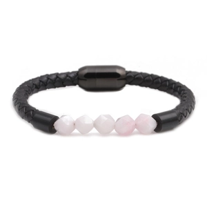 Detail view of black braided leather bracelet with five faceted pink stone beads and magnetic clasp