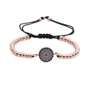 Adjustable Evil Eye charm bracelet with rose gold beads and sparkling blue zircon stones