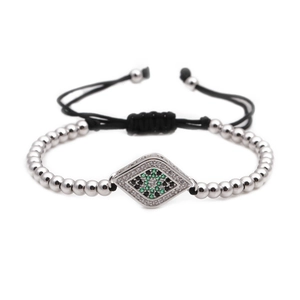 Bracelet à perles argentées avec pendentif œil en zircon vert et cordon tressé réglable