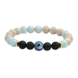 Yin Yang lava rock beaded bracelet with blue marble stones and golden spacers