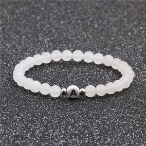 6mm white turquoise beaded bracelet with silver spacers and letter A charm