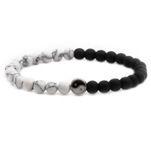 Elastic beaded stone bracelet with matte black onyx, white turquoise, and yin yang charm