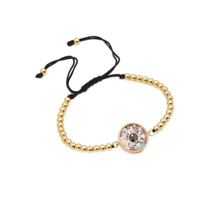 Adjustable woven bracelet with gold beads and multi-color cubic zirconia evil eye charm