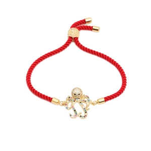 Adjustable red cord bracelet with gold octopus pendant and multicolor micro zircons