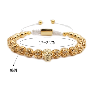 Bracciale intrecciato teschio dorato regolabile 17-22cm con perle 8mm e zirconi incastonati