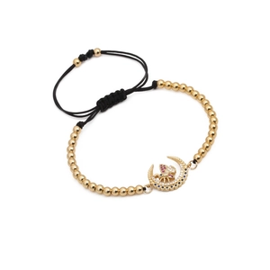 Bracciale intrecciato con luna e farfalla dorate e zirconi colorati su cordino nero