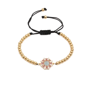 Bracciale intrecciato regolabile con perline dorate e ciondolo ottagonale in zircone