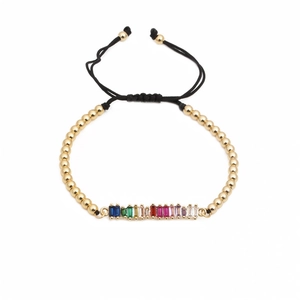 Bracciale intrecciato regolabile con pietre di zircone colorate e perline dorate lucide