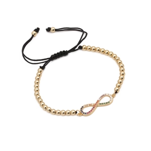 Bracciale regolabile in cordino nero con perline dorate e simbolo infinito in zirconi