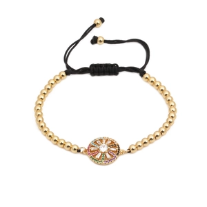 Adjustable gold bead bracelet with colorful zircon wheel pendant and black woven cord