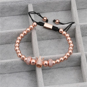 Men's rose gold crown bracelet with micro-pave CZ beads and adjustable woven cord