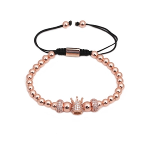 Rose gold woven beaded crown bracelet with cubic zirconia accents for men and women