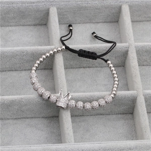 Detail of adjustable woven crown bracelet featuring silver cubic zirconia pave beads