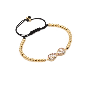 Bracelet à perles dorées réglable avec symbole de l'infini en zircon coloré sur fond blanc