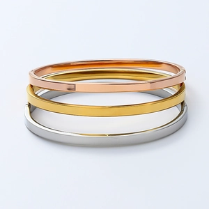 Three-piece set of 4mm titanium steel bangles in gold, rose gold, and silver finishes