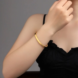 Minimalist 4mm 18K gold plated titanium steel stripe bangle for women on wrist