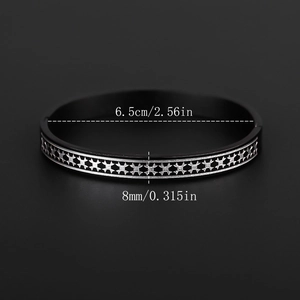 Gothic black matte stainless steel open bangle featuring silver cross relief patterns