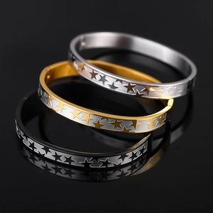 Lot de trois bracelets en acier inoxydable avec motif étoile évidé en or argent et noir