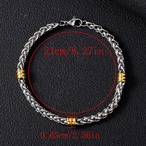 Bracciale da uomo in acciaio inossidabile con dettagli dorati su pelle nera