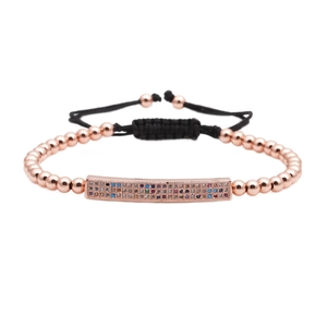 Adjustable rose gold bead bracelet with colorful cubic zirconia bar and black cord
