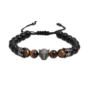 Men's black onyx beaded bracelet featuring a leopard head and adjustable woven cord