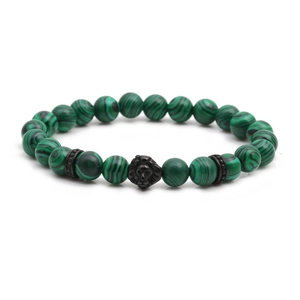 Stainless steel lion head bracelet with green malachite striped beads on white background