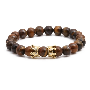 Bracelet en perles d'oeil de tigre avec accents de couronne dorée et style lion vintage