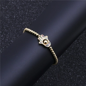 Pulsera ajustable mano de Hamsa dorada con circonitas de colores en micro-engaste