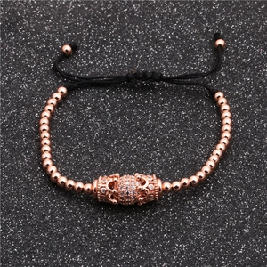 Bracelet en or rose avec perle en zircone micro-pavée et cordon noir ajustable
