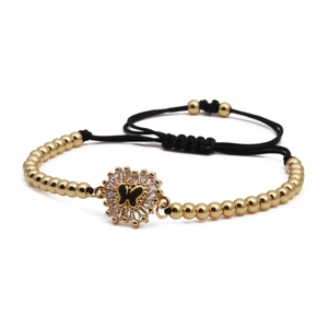 Verstellbares gewebtes Armband mit Goldperlen und Herz-Schmetterlings-Zirkonia-Anhänger